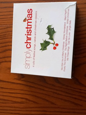 Christmas songs CD used, set of 4