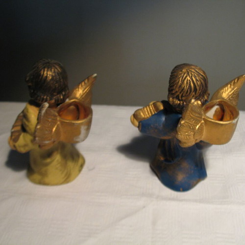 Pair of old clay angels like new