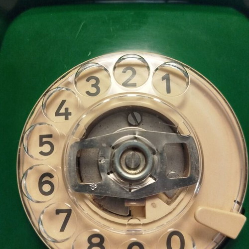 Old green wired telephone, functional