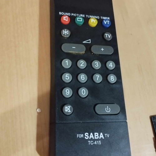 SABA TV TC-415 remote control used with battery compartment rust