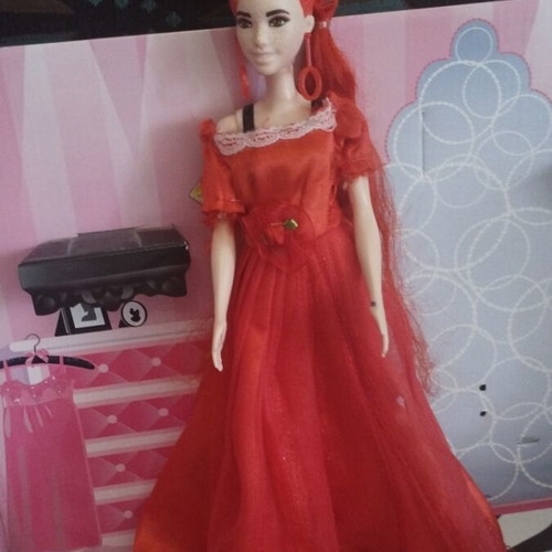 Barbie Colour Reveal doll with red dress