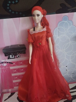 Barbie Colour Reveal doll with red dress