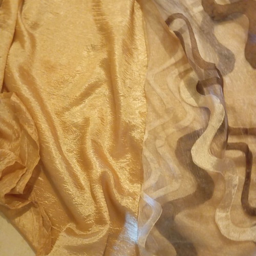 Double curtain like new with gold and geometric patterns