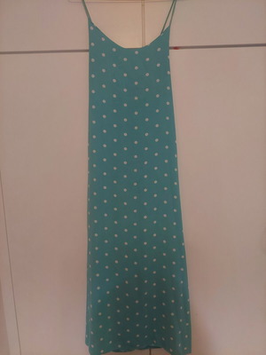 Light blue polka dot dress with crisscross back and side slits