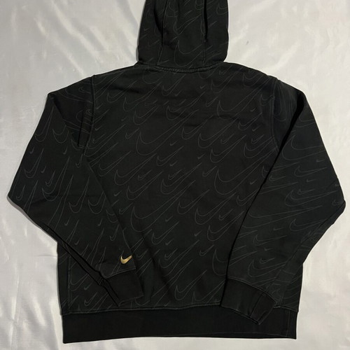 Nike black hoodie with Swoosh pattern, medium