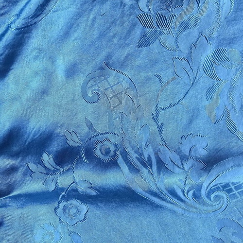 Vintage blue satin bedspread with fringes, used
