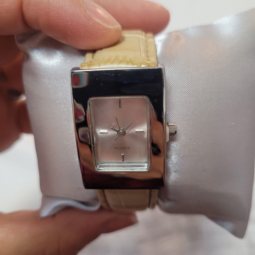 Quartz wristwatch, beige, new