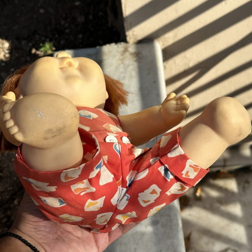 Vintage Cabbage Patch Kids doll used with clothes