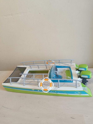 Playmobil catamaran used with panoramic window for water play