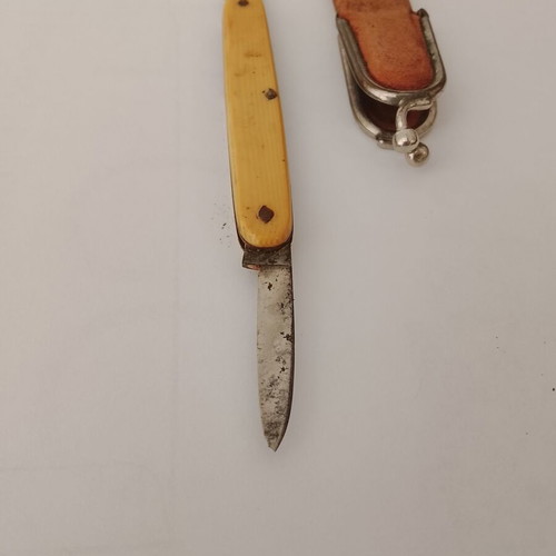 Vintage folding pocket knife with leather wallet case used
