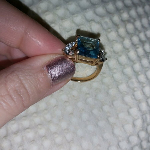 Ring with blue stone and 4 rhinestones, new, gold color