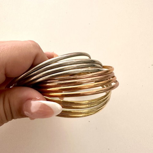 Infinity bracelet like new with mixed gold and silver tones