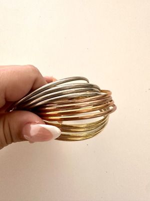 Infinity bracelet like new with mixed gold and silver tones