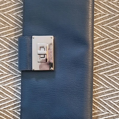 Michael Kors blue leather clutch bag like new with silver clasp