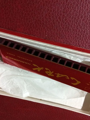 Harmonica in its box, unused