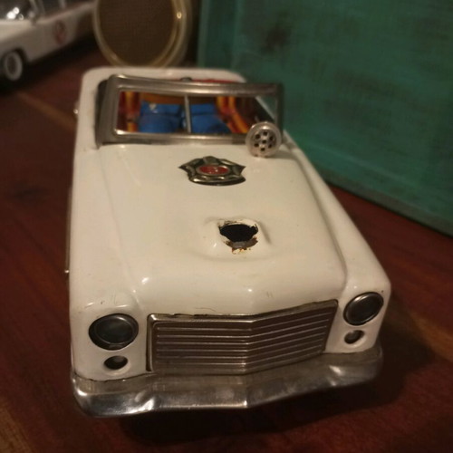 Old tin toy car for spare parts