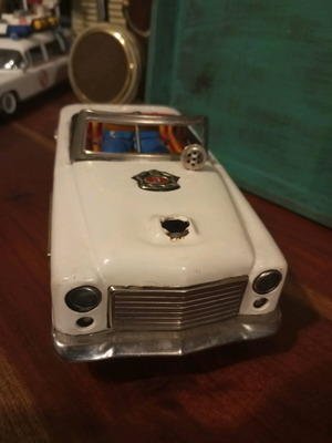 Old tin toy car for spare parts