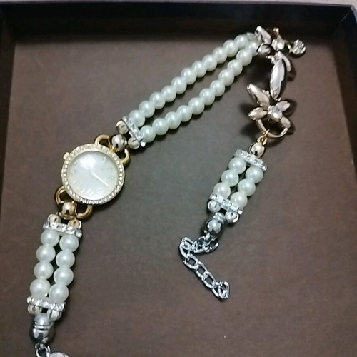 Bracelet watch new with pearls and gold details for women