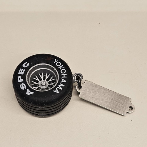 Yokohama F1 Tire Keychain like new, black and silver