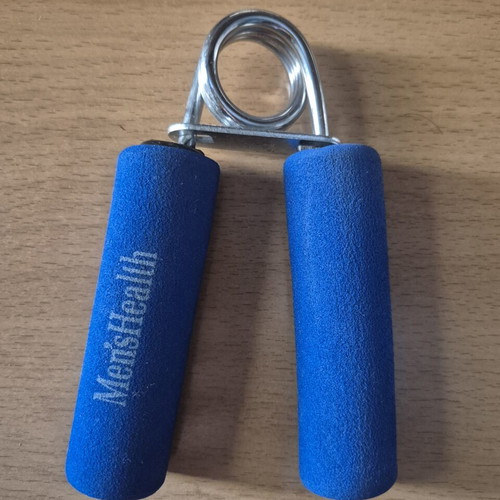 Men'sHealth hand grip strengthener with foam handles and metal spring