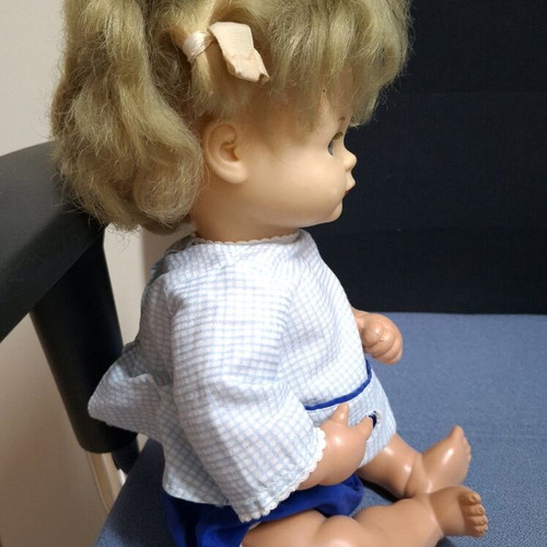 Vintage doll like new with child face, 30 cm tall