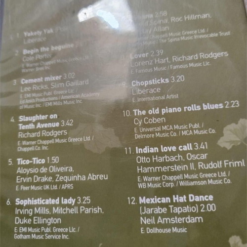 CDs Sophisticated Lady Liberace Orchestra and Carlos Santana like new, foreign music, pack of 2