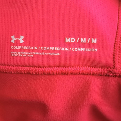 Under Armour HeatGear sports bra and shorts set like new, size M