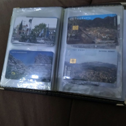 Collectible phone cards used with album