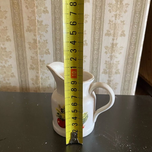 Small used jug with designs