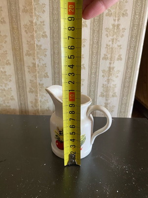Small used jug with designs