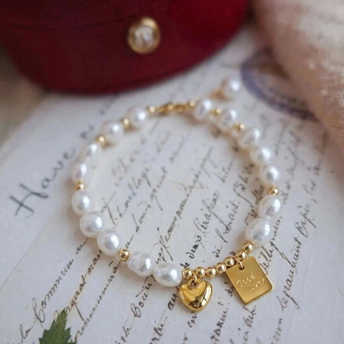 Freshwater Pearl Bracelet with Gold Good Luck Charm