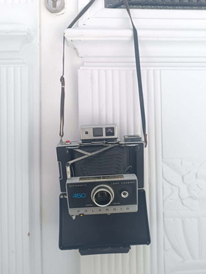 Polaroid Automatic 450 Land Camera like new, folding with glass lens