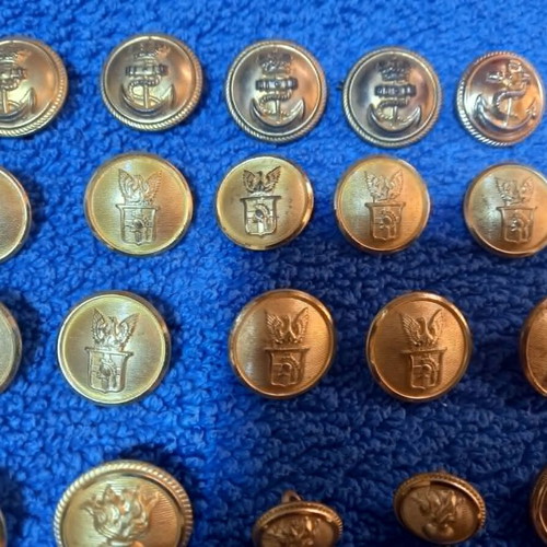 Collection of used antique and vintage brass uniform buttons