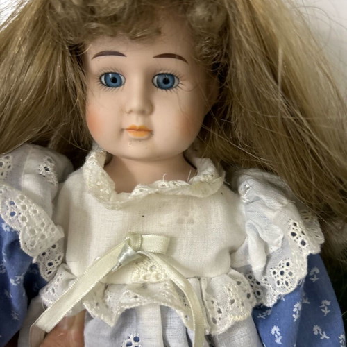 Porcelain doll Germany from the 70s like new