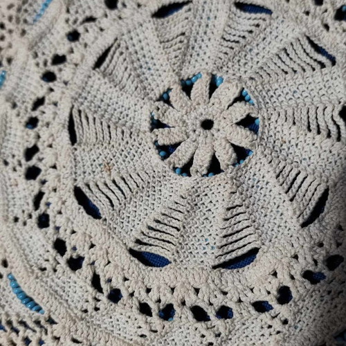 Handmade knitted doilies used with crochet and beads