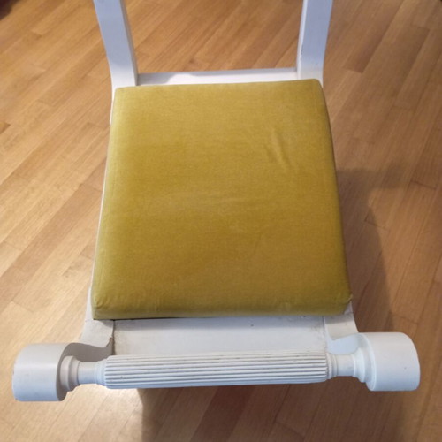 Stool used, missing two legs