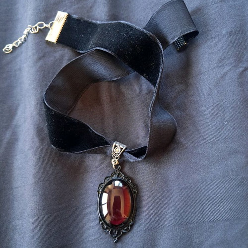 Necklace new with red detail and black