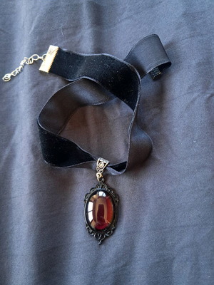 Necklace new with red detail and black
