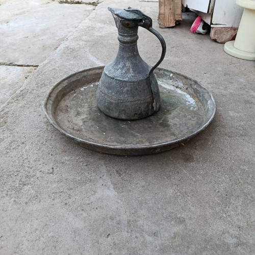 Authentic copper ewer used with traditional tray