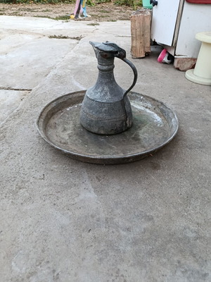 Authentic copper ewer used with traditional tray