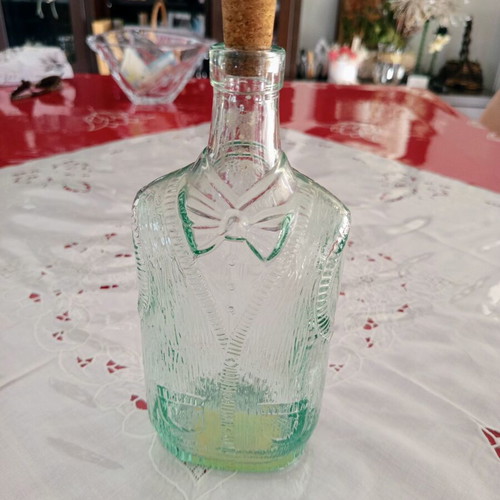 Vintage glass bottle Bormioli Rocco with vest and bow tie design, like new