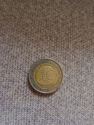 2 euro coin 2009 like new with die crack and extra metal