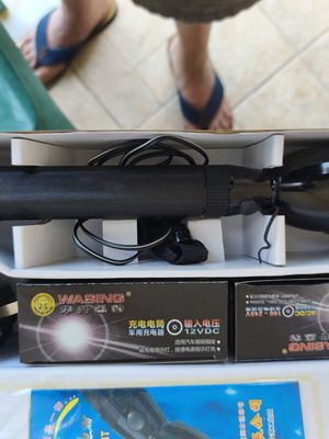 Flashlight new with rechargeable batteries and dual voltage