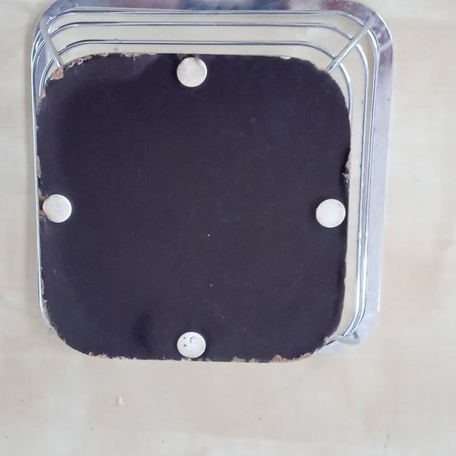 Metal fruit bowl with wooden base used