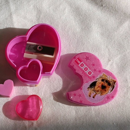 Pink heart-shaped sharpener with Yorkshire Terrier theme, like new