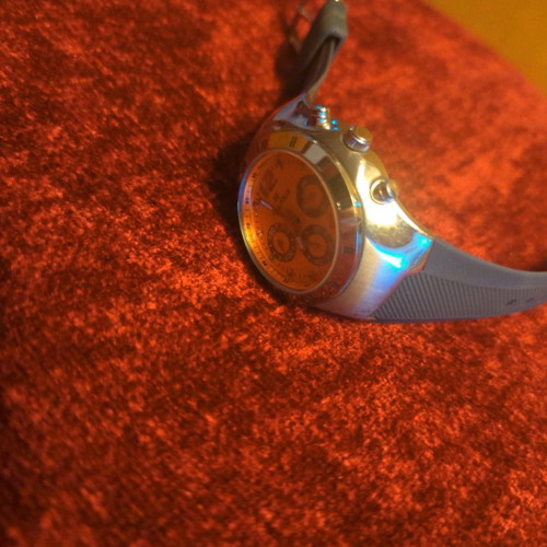 Folli Follie watch used with chronographs and orange dial