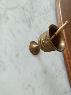 Miniature bronze mortar used