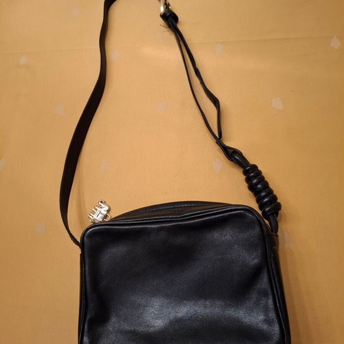 Shoulder bag black genuine leather like new with elephant detail