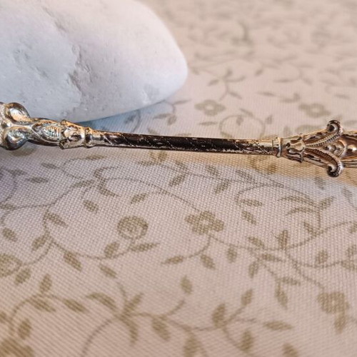 Vintage souvenir spoon from Stockholm with enamel decoration