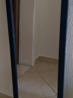 Mirror with blue frame used, 91 cm height × 30 cm width